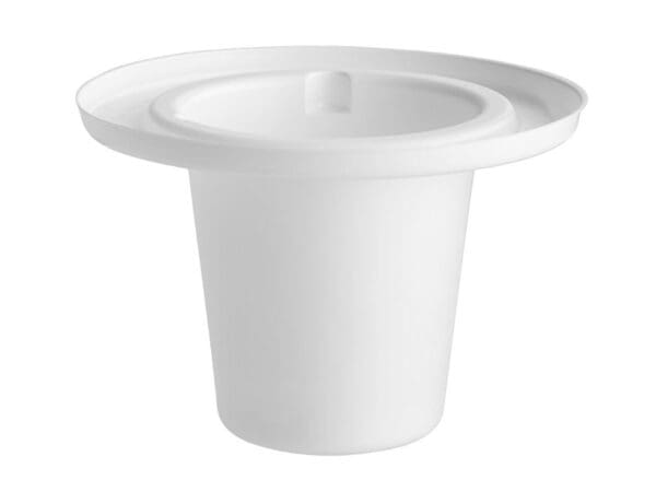 A white cup with a lid on top of it.