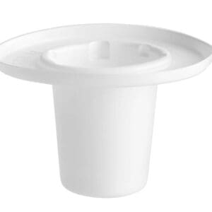 A white cup with a plate on top of it.